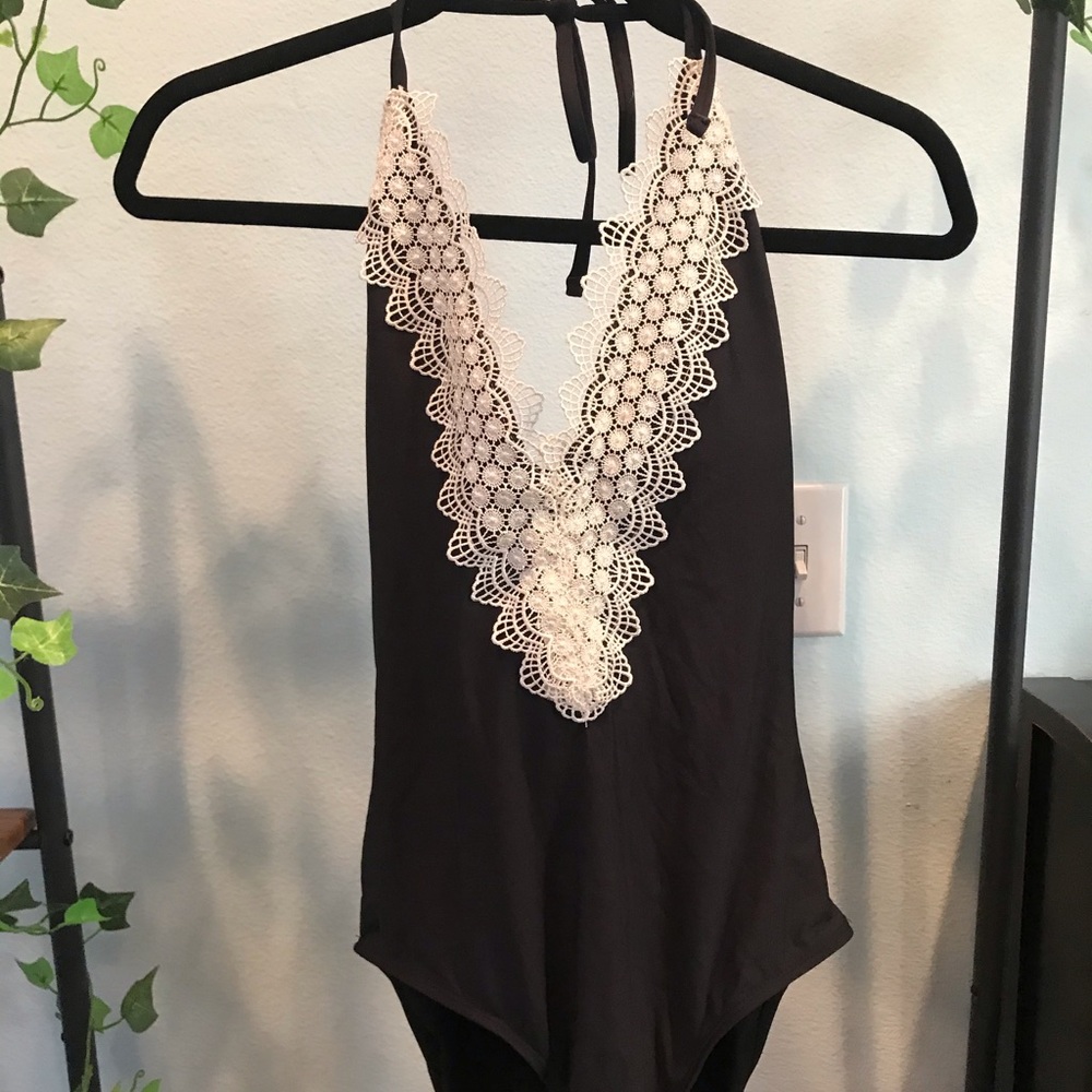 Black one piece swimsuit with lace trim